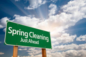 road sign stating that spring cleaning is near